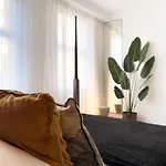Tranquil Oasis W 100Inch Cinema & Hammock, By The Design Traveller