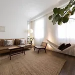 Tranquil Oasis W 100Inch Cinema & Hammock, By The Design Traveller