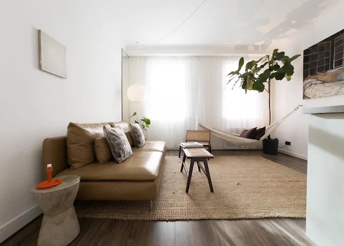 Tranquil Oasis W 100Inch Cinema & Hammock, By The Design Traveller