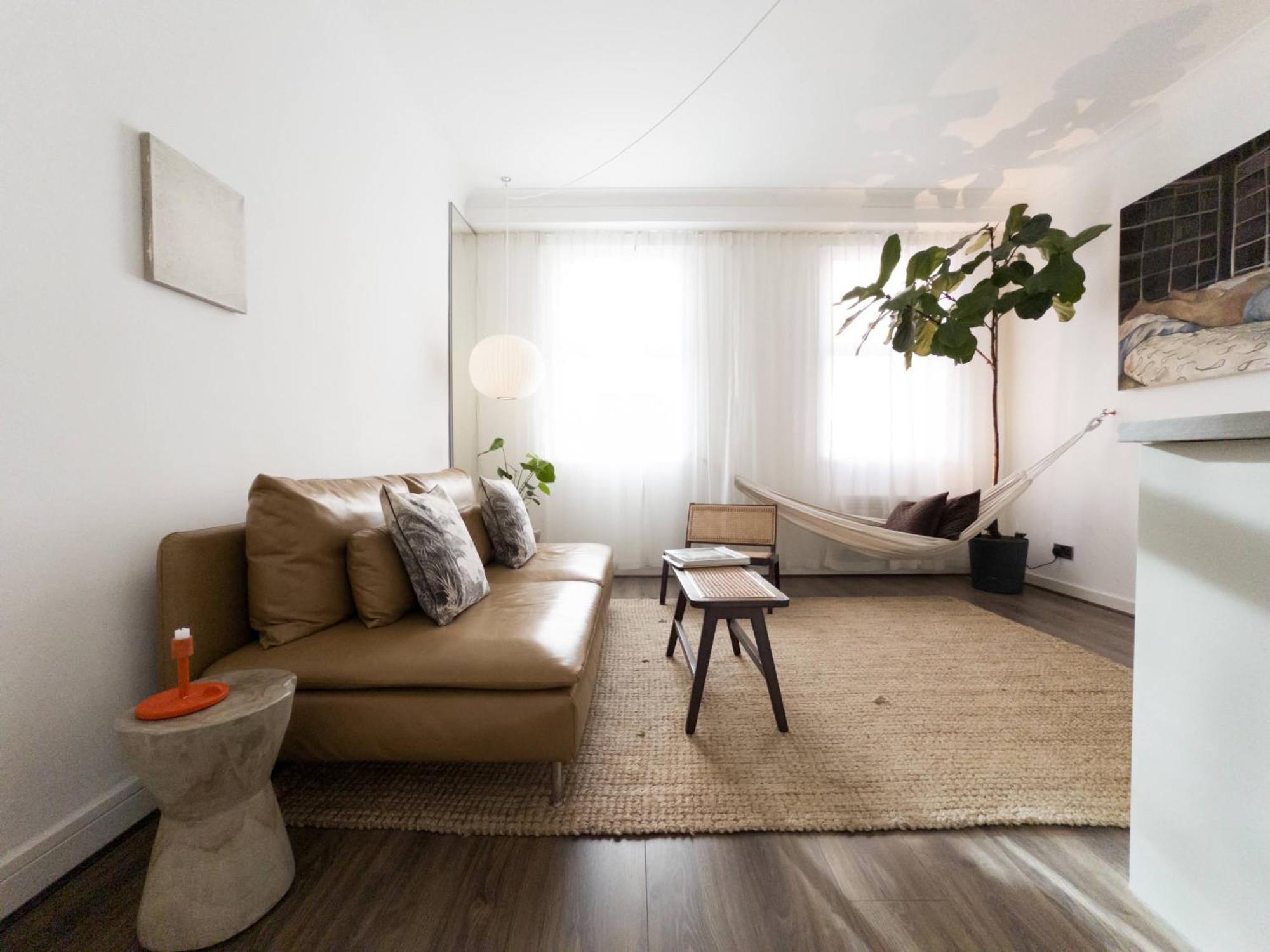 Tranquil Oasis W 100inch Cinema & Hammock, By The Design Traveller