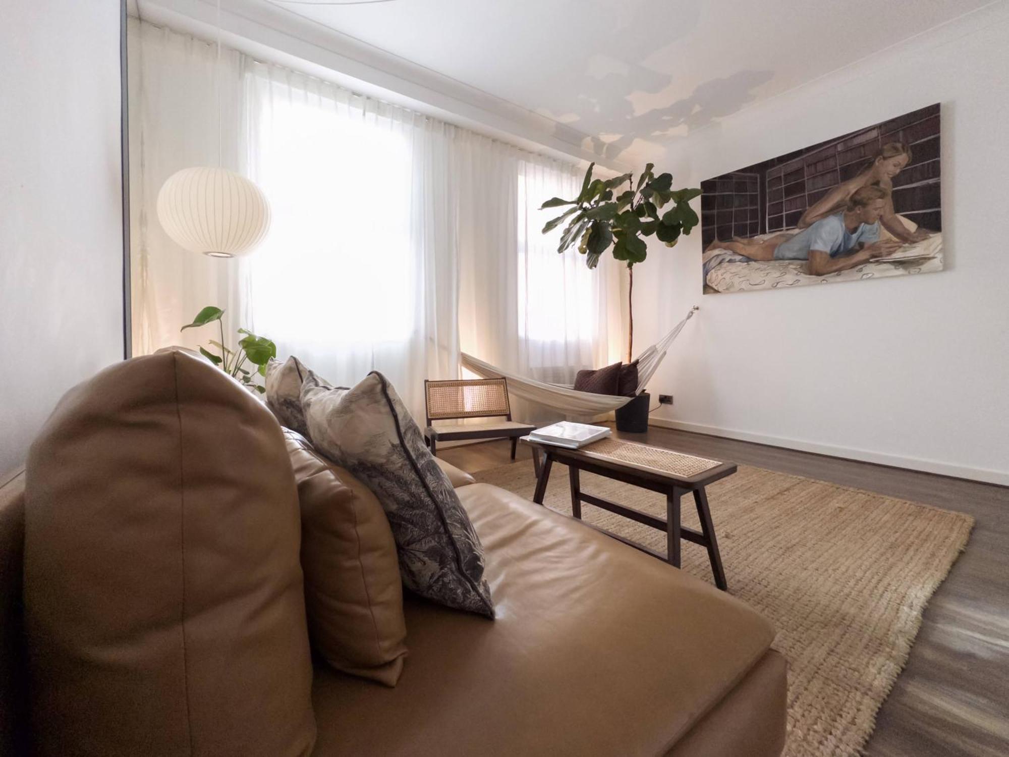 Tranquil Oasis W 100inch Cinema & Hammock, By The Design Traveller Apartment London